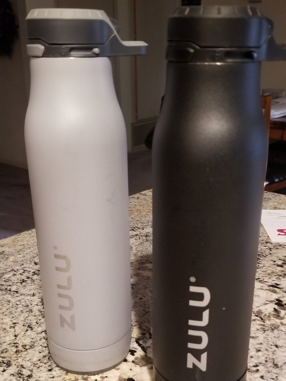Zulu 24oz flasks..1 black, 1 grey. great shape